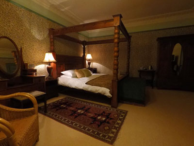 Four Poster Bed in a William Morris style with views over the Southern Uplands